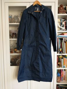 Norwegian vintage raincoat in marine blue. There is some use wear. Tellus Made in Norway Size: ca. S/XS Shoulder to shoulder: ca. 41.5 cm Armpit to armpit: ca. 54 cm Lengh: ca. 119 cm Measurements: see pictures (cm) Please check out the pictures for more information. If you want to purchase more than 1 item, please contact me first. I will adjust the postage for you. Please read this before you order! This is a vintage and second-hand item, therefore it is normal to have some traces. Please chec Blue Hooded Outerwear For Rainy Season, Blue Weatherproof Raincoat For Rainy Season, Navy Long Sleeve Winter Raincoat, Blue Windbreaker For Spring Travel, Blue Rainy Season Outerwear With Pockets, Winter Travel Blue Raincoat, Blue Fall Outerwear For Rainy Weather, Blue Long Sleeve Raincoat For Rainy Weather, Blue Windbreaker For Fall Travel