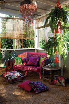 a living room filled with lots of colorful furniture