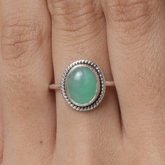 "Chrysoprase Ring, 925 Solid Sterling Silver Ring, Oval Gemstone Ring, Handmade Gemstone Ring, Women Silver Jewellery, Birthday Gift For Her Gemstone Name - Chrysoprase  Stone Quality - AAA Ring Weight - 2.65 gm Length -  2.2 cm Width - 2.1 cm Stone Shape - As shown in the picture You'll get the exact product as shown in the pictures We serve complete 925 sterling silver Jewelry and genuine properties of the stone. The products are dispatched from the small business from USA. Product Quality and Round Opal Chrysoprase Ring, Round Chrysoprase Opal Ring, Oval Green Moonstone Gemstone Ring, Green Oval Moonstone Gemstone Ring, Green Oval Moonstone Ring, Sterling Silver Emerald Ring Oval Cabochon, Green Oval Moonstone Ring In Sterling Silver, Silver Chrysoprase Round Rings, Oval Sterling Silver Stackable Rings For May Birthstone