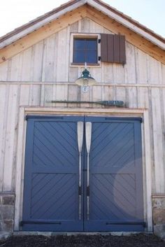 a facebook page with an image of two garage doors and the caption that says, what do you think?