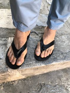 Mens Sandals, Flip Flops, Leather Sandals Men, Black Sandals, Beach Sandals, Gift for Him, Made from Genuine Leather in Greece. #MensSandals, #FlipFlops, #LeatherSandalsMen, #BlackSandals, #BeachSandals, #GiftforHim, #sandals #sandalsmen #menssandals #mensleathersandals #leathersandals #men #formen Black Leather Footbed Flip Flops For Beach, Black Leather Flip Flops For The Beach, Black Leather Sole Flip Flops For Vacation, Black T-strap Sandals With Rubber Sole For Beach, Flip Flops Style, Sandals Beach