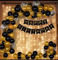 a happy birthday banner with balloons and streamers