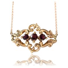 Garnet gemstones are the birthstone of January. The beautiful stones have been extremely popular since the 18th and 19th century, the gemstones are the ideal gem for that extravagant effect. Victorian garnets were faceted and clustered together for maximum effect, they are very romantic. Antique Victorian pendant featuring Garnets set in a warm ornate 9ct yellow gold setting. The pendant hangs on a new 9ct gold chain. The piece was converted from a brooch into a pendant by our expert Master Gold Luxury Victorian Antique Gold Necklace, Victorian Jewelry Necklace, 1800s Jewelry, Ornate Necklace, Antique Jewelry Victorian, Vintage Chain Necklace, Victorian Pendants, Garnet And Gold, Beautiful Stones