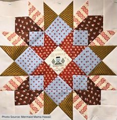 a close up of a patchwork quilt