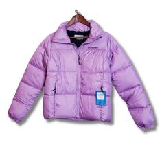 Columbia Perfect Puffer Jacket Womens Xs Purple Water-Resistant Full Zip Quilted New With Tags ~ Excellent Condition No Issues Stay Cozy And Stylish In The Women's Columbia Puffer Jacket Crafted With Water-Resistant Fabric, This Jacket Features: Thermarator Insulation To Keep You Warm In Colder Weather. For Added Comfort And Utility, The Jacket Comes Equipped With A Chin Guard, Zippered Hand Pockets, And Elastic Cuffs. Ideal For Those Who Love Outdoor Adventures And Seeking To Stay Warm During Cold Seasons. Chest: 19.5 In Length: 23.5 In Weight: 1lb 9.7oz Ship Same Day And Next! Tags: Puffer Winter Barbie Core Academia Travel Thermarator Insulation Cozy Comfortable Bin X Fitted Quilted Outerwear For Outdoor Activities, Fitted Puffer Jacket For Outdoor Activities In Fall, Fitted Puffer Jacket For Fall Outdoor Activities, Insulated Long Sleeve Outerwear For Hiking, Winter Fitted Puffer Jacket For Outdoor Activities, Fitted Outerwear For Outdoor Activities In Fall, Sporty Purple Outerwear For Cold Weather, Purple Long Sleeve Outerwear For Outdoor, Spring Outdoor Down Outerwear