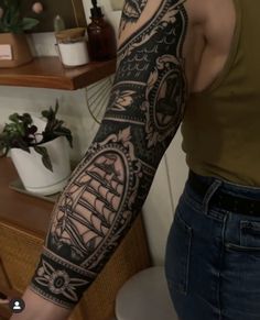 a person with a tattoo on their arm