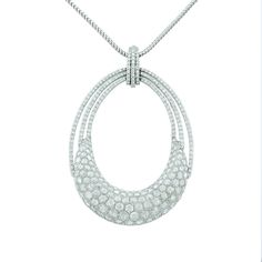 A wonderfully unique and substantial diamond pendant featuring 8.40 carats of rose cut and round cut diamonds set in 18K white gold. Beautiful shine and sparkle radiate from this piece which comes with a 24 inch gold chain. Dimensions: 2.75 x 1.85 inches Oval Rose Cut Diamond Necklace - Fine Jewelry, Luxury Oval Diamond Necklace With Rose Cut, White Gold Diamond Necklace With Pave Setting, White Gold Oval Diamond Necklace With Pave Setting, Luxury Diamond Oval Pendant Necklace, White Diamond Pendant Necklace With Rose Cut, White Diamond Necklace With Oval Pendant Accents, Oval White Diamond Necklace, Luxury Crystal Pendant Diamond Necklace