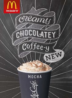 a cup of coffee with whipped cream on top and the words, creamy chocolatey coffee - new