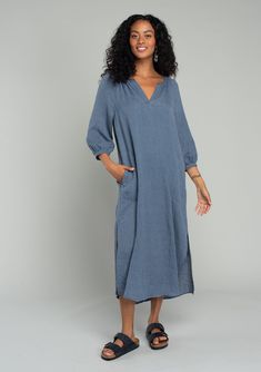 A classic bohemian mid-length dress designed in a loose relaxed fit. Relaxed fit 3/4 length sleeves Mid-length Side slits Split v-neckline Side pockets Lined Classic bohemian midi dress The definition of throw-on-and-go. Our relaxed midi dress is the perfect balance of effortlessly laid-back yet refined. Featuring 3/4 length sleeves, leg-baring side slits, and essential side pockets. A versatile style for your next vacation, we love to throw it on over our swimsuit at the beach or dress it up wi Bohemian Midi Dress, Affordable Boho, Boho Midi Dress, Navy Midi Dress, Cute Sandals, Mid Length Dresses, Online Sales, Versatile Style, Boho Dress