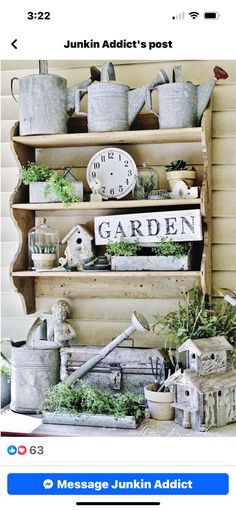 an old wooden shelf with pots and pans filled with plants on top of it