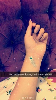 a woman's arm with a tattoo on it and the words you will never know, i will never show