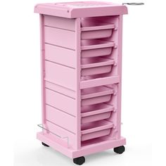 a pink trolley with lots of trays on it's sides and wheels for storage