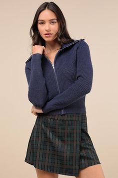 From the slopes to the streets, make your winter more adorable with the Lulus Cozy Inclination Navy Blue Cropped Zip-Front Collared Sweater! Soft and stretchy medium-gauge knit shapes long sleeves with drop shoulders and fitted cuffs. Collared neckline tops a bodice with figure-flattering panels at the bust and a functional silver zipper at the front. Cropped, ribbed knit hem completes the look. Fit: This garment fits true to size. Length: Size medium measures 18.5" from shoulder to hem. Bust: G Silver Zipper, Collar Sweater, Custom Fit, Sweater Sizes, Sweater Top, Ribbed Knit, Bodice, Zip Ups, Navy Blue