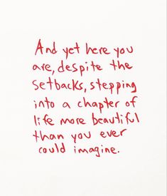 a handwritten poem on white paper with red ink