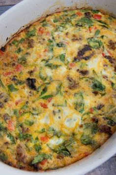 a casserole dish with meat, cheese and vegetables