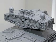 a lego model of a star wars ship is shown in front of a white background