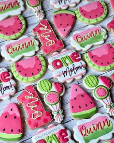 decorated watermelon cookies are displayed on a table