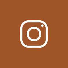 the instagram logo on a brown background