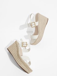 These espadrille wedges are the perfect warm-weather staple that you will find yourself reaching for again and again. In clean and striking chalk, they will take you from a seaside stroll to brunch at the mall effortlessly. We also love the striking metal buckle that adds an eye-catching detail to the shoe's simple and elegant design. From frayed jeans to maxi dresses, these versatile shoes will make any outfit look chic and stylish. Vacation Style Tropical, Senior Outfits, White Wedge Sandals, Vacation Fashion, Resort Chic, Versatile Shoes, At The Mall, White Wedges, Frayed Jeans