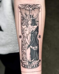 a tattoo on the arm of a woman with an image of two women in black and white