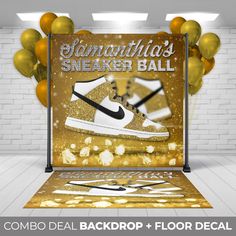 an image of a sneaker ball event backdrop with gold balloons and white sneakers on the floor