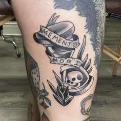 a tattoo on the leg of a person