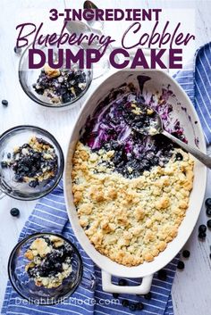 blueberry cobbler dump cake in a white baking dish with two glasses on the side