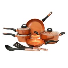 an assortment of pots and pans with utensils