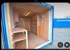 the inside of a storage container with shelves