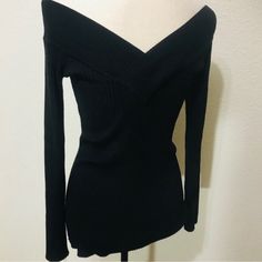 Nwt Candie’s Bodycon Ribbed V-Neck Sweater Black Color Ribbed Fitted Bodycon Style Front And Back Crossover V-Neck Soft And Stretchy Rayon/Polyester Blend Size S New With Tags Perfect Condition The Last Photo Has The Sunlight On The Left Side, Not White Marks Black Fitted V-neck Sweater, Ribbed Tops For Winter Night Out, Long Sleeve Tops For Winter Date Night, Winter Long Sleeve Tops For Date Night, Long Sleeve Tops For Date Night In Winter, Ribbed Stretch V-neck Sweater, Fitted Ribbed V-neck Sweater With Long Sleeves, Fitted Ribbed V-neck Sweater, Fitted Black V-neck Sweater For Spring