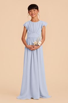 This sweet ruffle-sleeved dress is a dream for a junior bridesmaid. This design features a waistband tie in back for juniors who are between sizes. Junior Bridesmaid Dresses For Kids, Sage Green Junior Bridesmaid Dresses, Ice Blue Bridesmaid Dress, Bridesmaid Dress Chiffon, Junior Dress, Tuxedo Women, Dusty Blue Bridesmaid Dresses, Ice Dresses, Birdy Grey