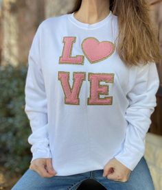 "Custom Embroidered Love Sweatshirt, College Sweatshirt with Love, Sorority Pullover with Chenille Applique Letters, Cozy Oversized Crewneck The word Love with a heart for the O will be embroidered onto a Bella Canvas Brand Drop Shoulder Sweatshirt. These sweaters run a true to size.  If you are in the upper end of your current size, I would suggest to order one size up for a looser fit.  Model is wearing a Medium and has a 34.5\" bust. Colors available are White, Black, Gray, Mustard, Mauve, Navy, Red, and Blue. Embroidery color will be done in color of your choice.  Leave leave instructions in the personalization box or the notes to seller at checkout. 7 oz./yd² (US) 11.7 oz./L yd (CA) 52/48 airlume combed and ringspun cotton/polyester fleece, 32 singles Athletic Heather: 90/10 airlume c Chenille Applique, Patch Letters, Applique Letters, Drop Shoulder Sweatshirt, Love Sweatshirt, Dropped Shoulder Sweatshirt, College Sweatshirt, Oversized Crewneck, Pullover Sweater Women