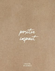 a book cover with the words positive impact written in white ink on top of brown paper