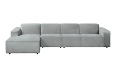 a gray sectional couch sitting on top of a white floor