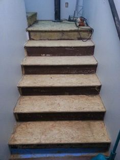 a set of stairs leading up to a door