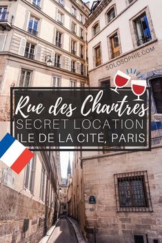 an alley way with french flags and buildings in the background that reads rue des chatres secret location, le de la cite paris