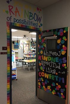 an open door to a classroom with rainbow writing on the front and back doors that say, know your rainbow of possibilities