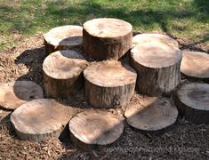 several pieces of wood stacked on top of each other in the middle of a field