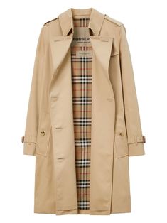 Find BURBERRY The Kensington Mid-length Trench Coat on Editorialist. honey cotton classic collar epaulettes double-breasted button fastening long sleeves belted waist belted cuffs two side slit pockets mid-length This item is made from at least 50% organic materials. Learn more about what makes a product Conscious on our Conscious Criteria page Burberry Raincoat, Burberry Shorts, Couples Poster, Burberry Trench, Burberry Trench Coat, Double Breasted Trench Coat, Poster Ideas, Trench Coat Black, Organic Materials