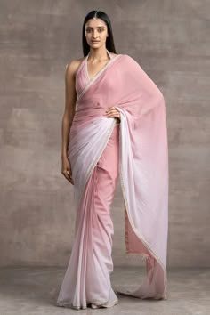 Shell, pink ombre saree in chiffon base with a crystal tassels embroidered border. Comes with a halter neck fluted blouse in sheated fabric. Component: 2 Pattern: Embellishment Type Of Work: Crystals Neckline: Halter Sleeve Type: Sleeveless Fabric: Chiffon Color: White,Pink Other Details:  Bead tassels on the blouse back Closure: Back hook Occasion: Destination Wedding - Aza Fashions Saree Wearing Styles, Saree Women, Saree Wearing, Fancy Saree, Designer Saree Blouse, Saree Style