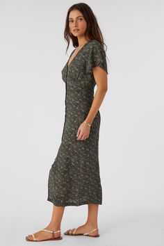 Essential woven midi dress that has a front button design, v-neckline and flutter sleeve detail. O'Neill Women's woven midi dress 41" Center front length Front button closure Flutter sleeve detail V-neckline Back waist smocking Allover print 100% Viscose Crepe | O'Neill Women's Rayney Ava Ditsy Button Front Midi Dress, Size Small, Viscose Midi Dress For Women, Loungewear Outfits, Spring Suit, Loungewear Dresses, Girl Beanie, Womens Wetsuit, Denim Sweater, Woman Weaving, Top Graphic Tees