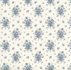 a blue and white flowered wallpaper with many small flowers on the bottom half of it