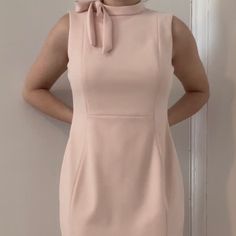 Light Baby Pink Calvin Klein Dress With Bow Around Neck. Us Women's Size 8 Never Worn - In Perfect Condition I'm 5'3 And The Dress Length Is Knee-Length (Right Above The Knee) Feminine Fitted Sleeveless Pink Dress, Cute Sleeveless Solid Color Dress, Fitted Pink Sleeveless Dress For Work, Fitted Calvin Klein Dress, Pink Fitted Sleeveless Cute Dress, Cute Pink Fitted Sleeveless Dress, Cute Fitted Pink Sleeveless Dress, Cute Sleeveless Dresses, Calvin Klein Sleeveless Dress For Daywear