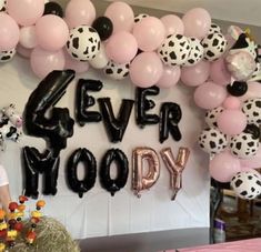 a birthday party with balloons and decorations for the 4 ever moo - dy