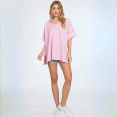 Proudly Made in USA This 100% USA cotton oversized v-neck tee is stylish and comfortable. The mineral wash gives it a unique look while the raw edge detail adds texture. Made in the USA with high quality materials, it is designed to last and offers a slouchy and long fit for ultimate comfort. Mineral Washed Oversized V-Neck Tee Raw Edge Detail Very Oversized & Slouchy Long Length Super Cute Pink Color 100% USA Cotton High Quality - Made in Last Medium Weight Made in USA Size Info: Model is weari Cotton Relaxed Fit V-neck Top For Loungewear, Relaxed Fit Cotton V-neck Top For Loungewear, Spring Oversized V-neck T-shirt, Spring Loungewear Washed T-shirt, Oversized V-neck T-shirt For Spring, Casual Frayed Hem T-shirt For Loungewear, Casual T-shirt With Frayed Hem For Loungewear, Cotton V-neck Top For Loungewear, Spring Cotton V-neck Top For Loungewear