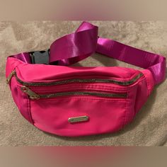 Nwot Pink Fanny Pack This Has A Double Zipper With An Additional Zipper Pocket Inside It Has An Adjustable Strap To Be Worn On The Hip Or As A Crossbody Goldtone Hardware Appx Measurements - 13” Wide - 6” Height Pet Free And Smoke Deee Home Trendy Pink Belt Bag With Zipper Pocket, Pink Belt Bag With Zipper Pocket, Trendy Pink Belt Bag With Pockets, Casual Pink Belt Bag With Zipper Closure, Trendy School Belt Bag With Zipper Closure, Fanny Pack, Size 13, Inside Pocket, Zipper Pocket