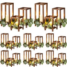 eight wooden lanterns with flowers and greenery in them