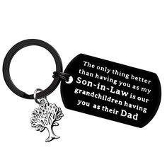 a black keychain with a tree on it and the words, the only thing better than having you as my son - in law is our grandchilden having you as their dad