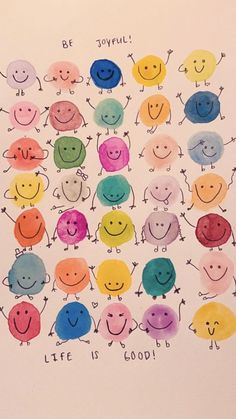 a group of smiley faces drawn in different colors