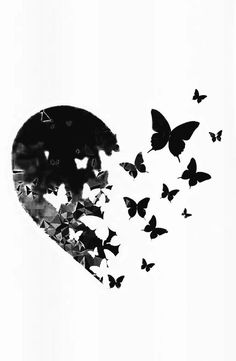 a black and white photo with many butterflies flying around the image, which is shaped like a heart